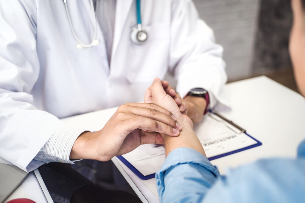 Doctor checking health primary of male patient for consultation health in hospital health. health and doctor concept.